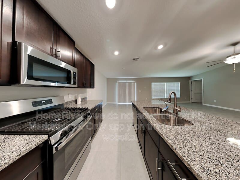 Riverview House: 10318 Scarlett Skimmer Dr