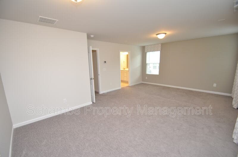 Apex Townhome: 1107 Doe Blossom Ln
