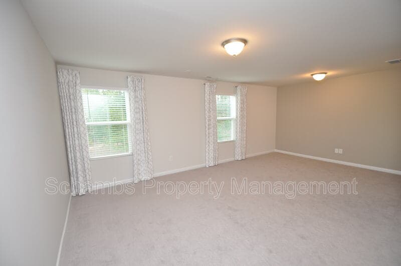 Apex Townhome: 1107 Doe Blossom Ln