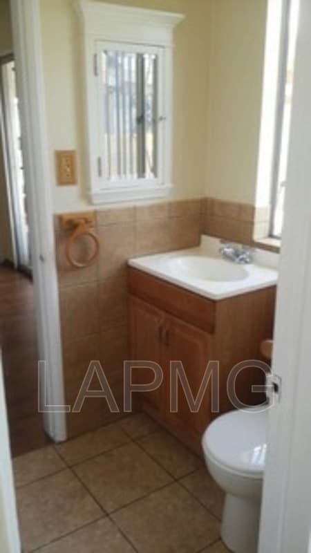 East Los Angeles House: 6165 E Olympic Blvd