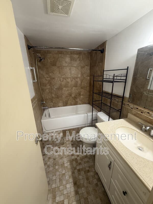 Sheffield Condo: 2804 East 18th Avenue