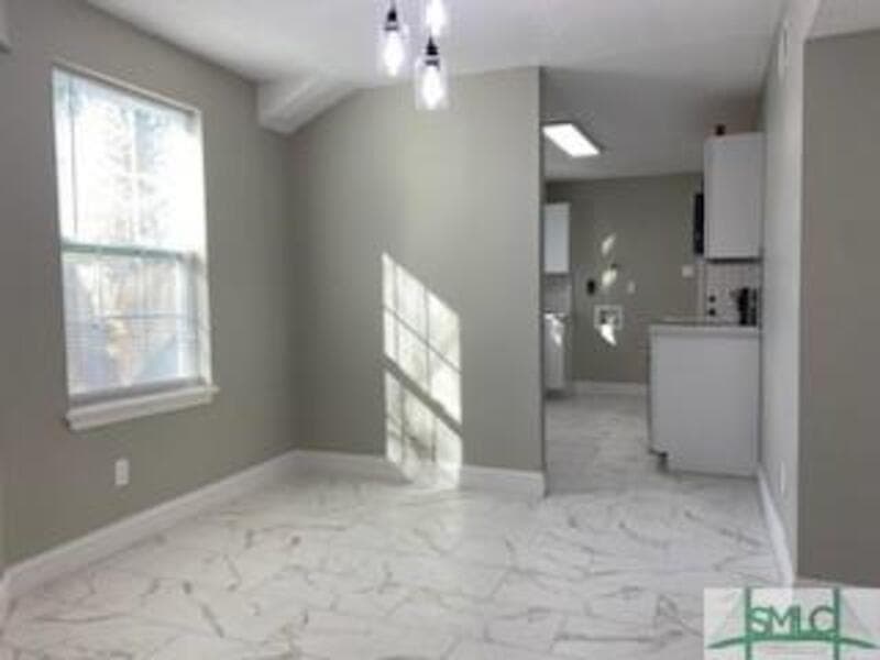 Savannah Condo: 1000 West 53rd Street - Lower Unit