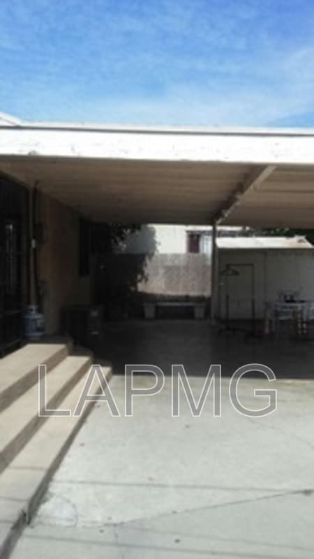 East Los Angeles House: 6165 E Olympic Blvd