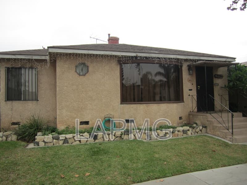 East Los Angeles House: 6165 E Olympic Blvd