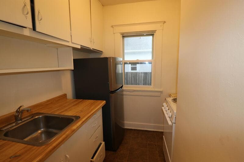 Manitowoc Condo: 1002 N. 13th St - 1302 Wisconsin Ave - 1002 N 13th St A
