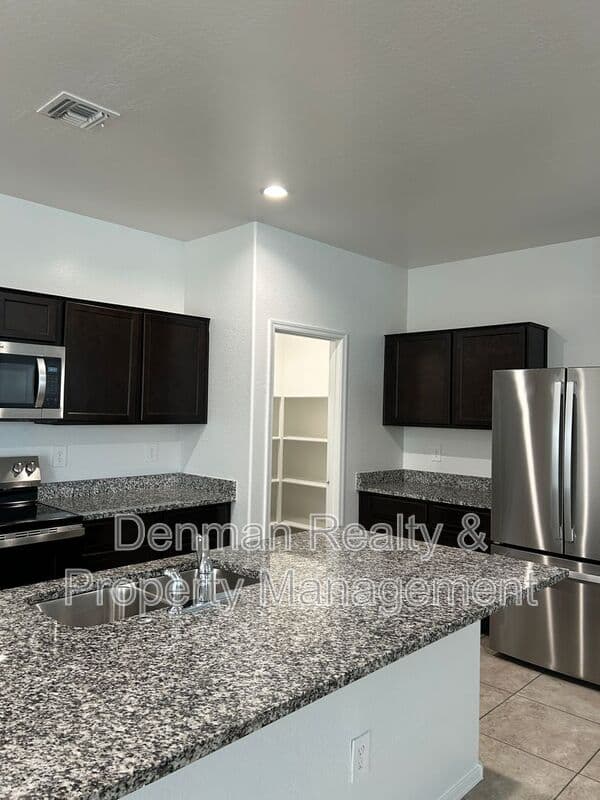 Surprise House: 18351 W. Artemisa Avenue