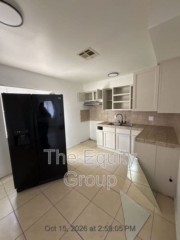 Dinuba House: 240 W Whittaker Way