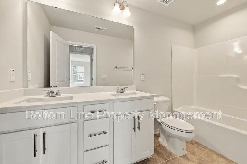 Durham Townhome: 5811 Woodlawn Dr