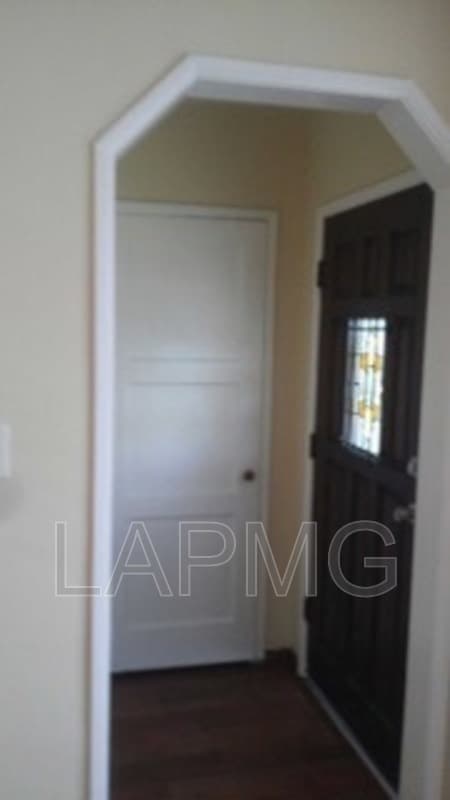 East Los Angeles House: 6165 E Olympic Blvd