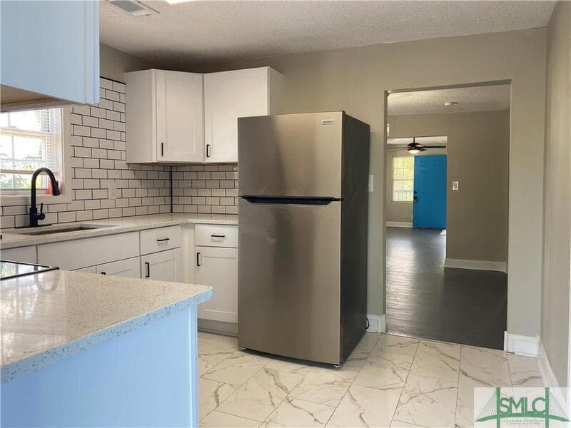 Savannah Condo: 1000 West 53rd Street - Lower Unit
