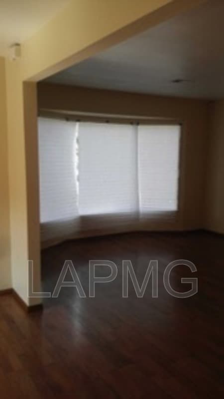 East Los Angeles House: 6165 E Olympic Blvd