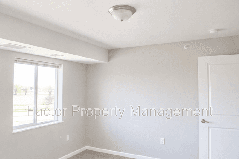 Belle Plaine Condo: 561 Elk Street South