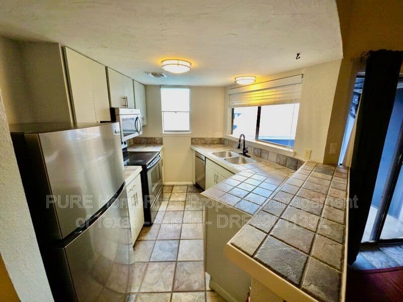 Austin Condo: 2500 Burleson Rd