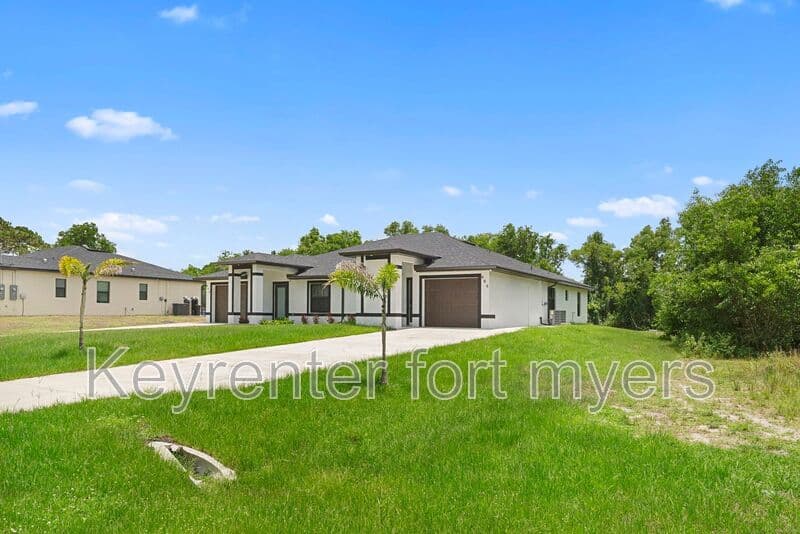 Lehigh Acres House: 668 CHEMSTRAND ST E