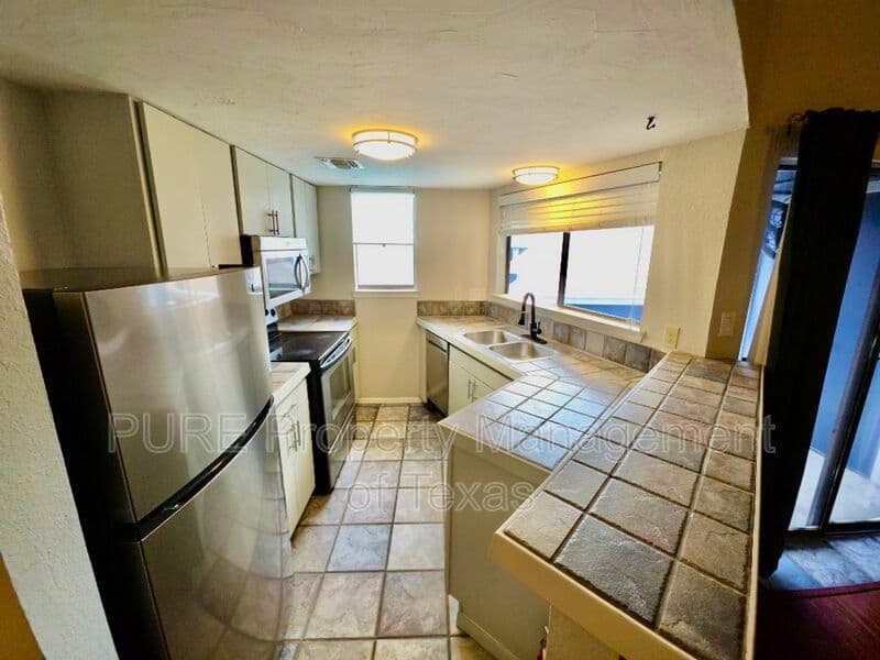 Austin Condo: 2500 Burleson Rd