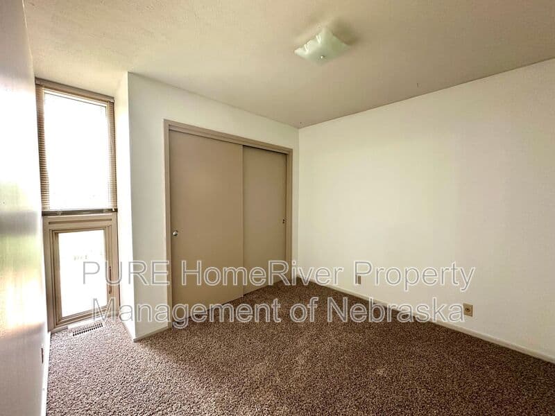 Omaha Townhome: 1631 N 109th Plz