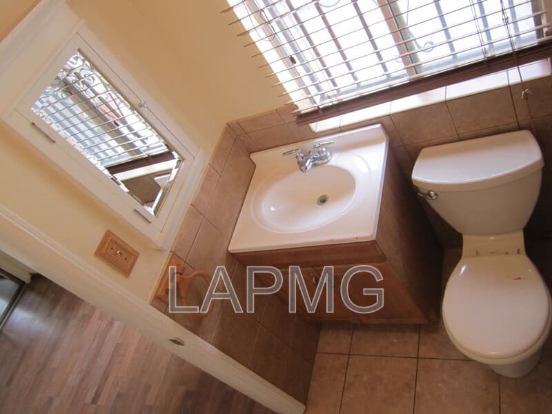 East Los Angeles House: 6165 E Olympic Blvd