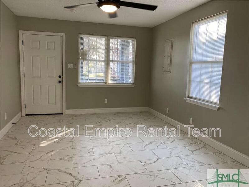 Savannah Condo: 1000 West 53rd Street - Lower Unit