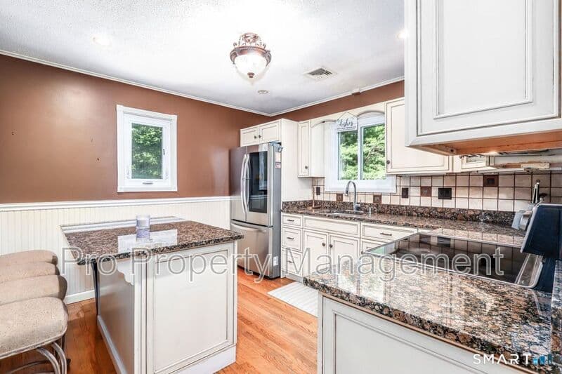 New Milford House: 212 Chestnut Land Rd.