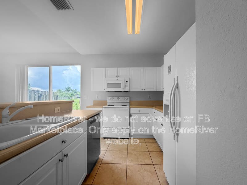 Homestead Townhome: 230 SE 29th Ave