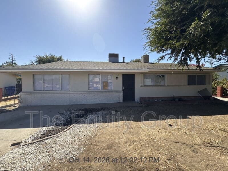 Dinuba House: 240 W Whittaker Way