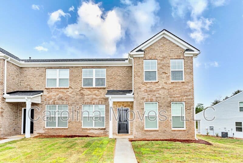Anderson Townhome: 117 Village Main