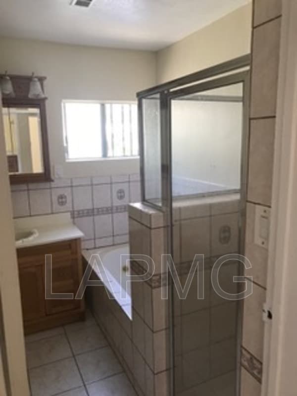 East Los Angeles House: 6165 E Olympic Blvd