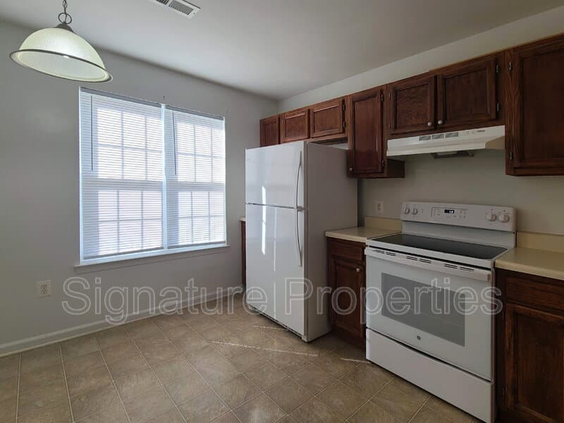 Fredericksburg Townhome: 207 Heritage Commons Dr