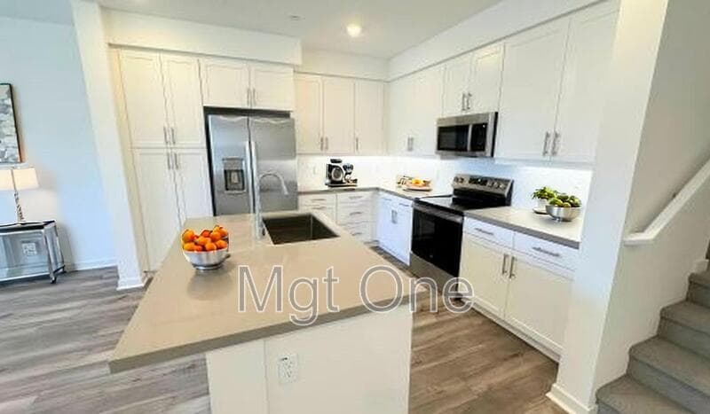 Eastvale Condo: 6111 Victoria Way Unit 107