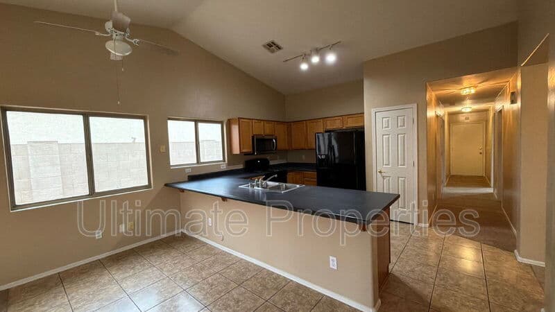 Surprise House: 13461 W Statler St