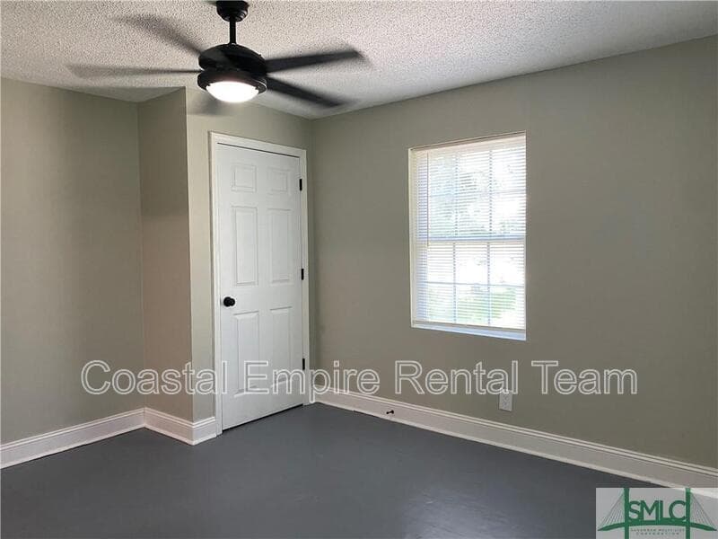 Savannah Condo: 1000 West 53rd Street - Lower Unit